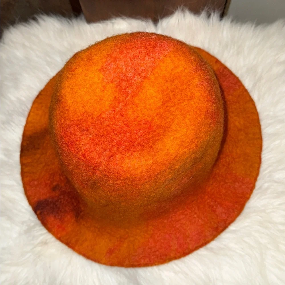 Camilla Krueger Designs orange marbled artisan hand-felted wool sculptural hat